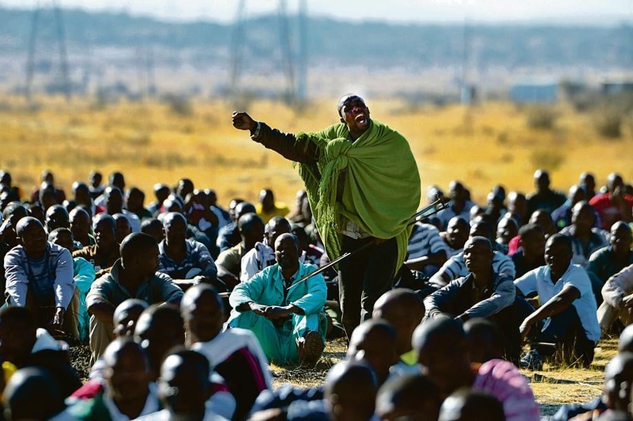 Strike leader Mgcineni Noki, also known as the man in green blanket, rallied the miners at Marikana ahead of their encounter with police that left more than 35 miners dead who were shot by the police Picture:Leon Sadiki. 2012-08-16 
