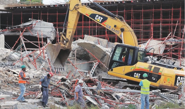 Rescuers search for construction workers unaccounted for after the partial collapse of the Tongaat Mall in 2013. Two workers were killed.: Picture: Rajesh Jantilal