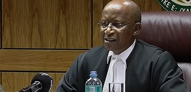 The old flag representative of apartheid which has been
declared a crime against humanity, says judge

