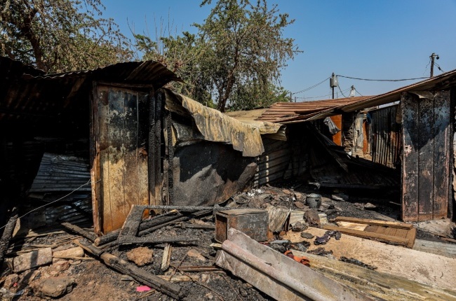 Five shacks caught the fire that claimed the lives of five children.