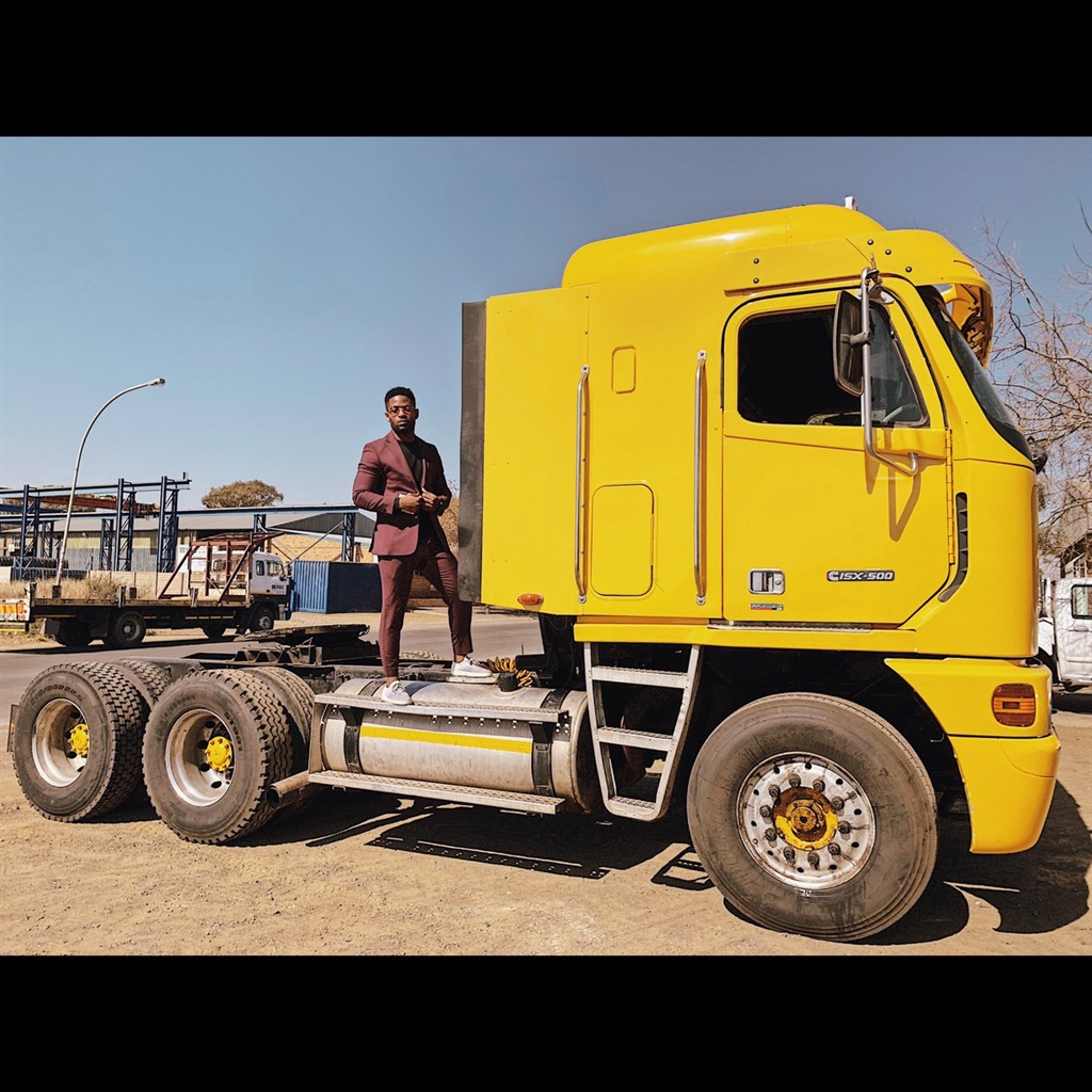 Price Kaybee on a yellow truck