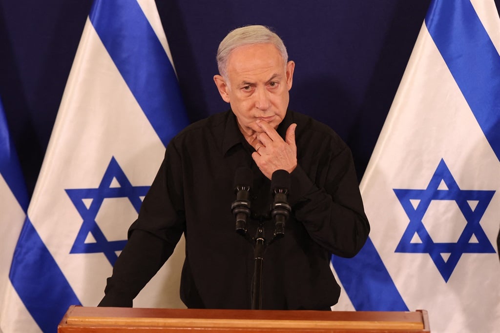 Israeli Prime Minister Benjamin Netanyahu speaks during a press conference in the Kirya military base in Tel Aviv on 28 October 2023 amid ongoing battles between Israel and the Palestinian group Hamas. 