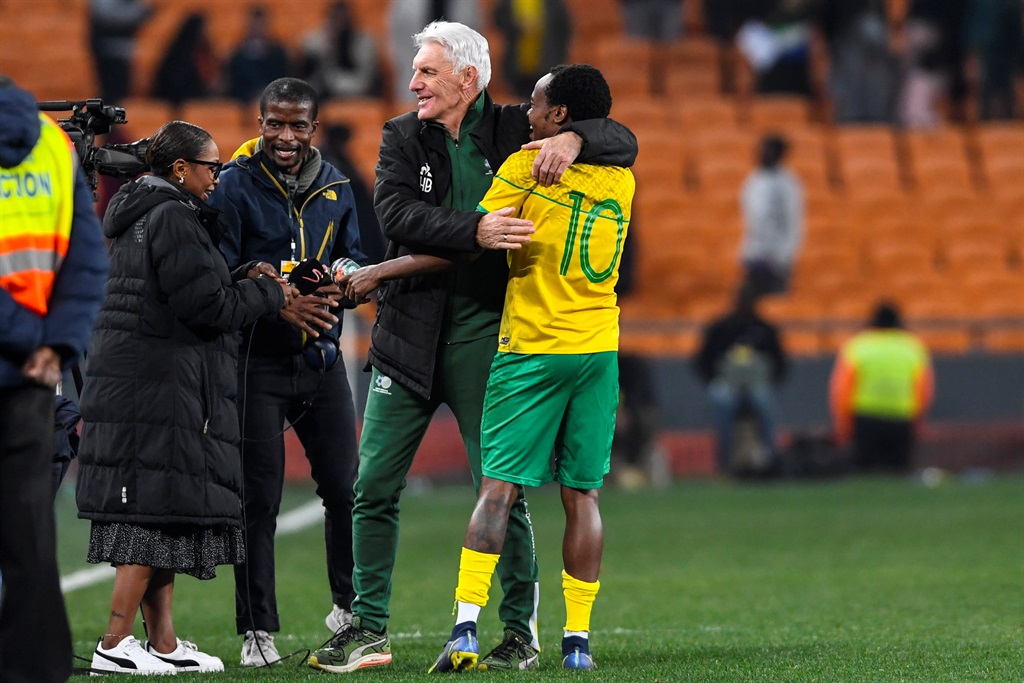 Hugo Broos and Percy Tau of South Africa during the Africa Cup of Nations, Qualifier match between South Africa and Morocco at FNB Stadium on June 17, 2023 in Johannesburg, South Africa. 
