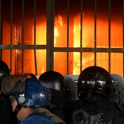 Paraguay's biggest prison set ablaze, rioting inmates take guards hostage