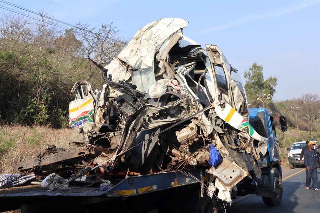 Six people were killed after a taxi and a truck collided head-on. 