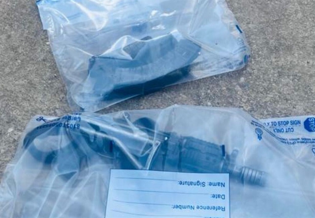 Photograph of a seized firearm in a police plastic