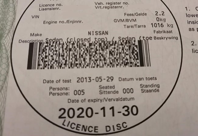 A vehicle licence disc.