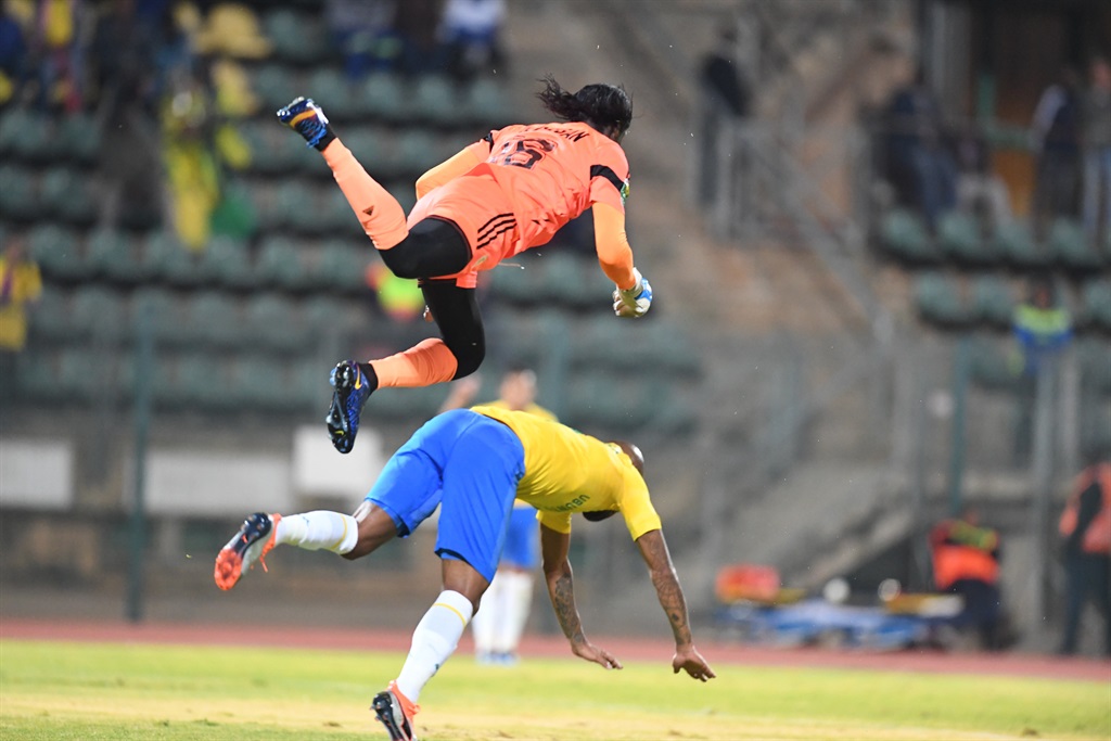 Oupa Manyisa of Mamelodi Sundowns and Dove Abotchi of AS Togo-Port during their CAF Champions League match. Picture: Lefty Shivambu/Gallo Images