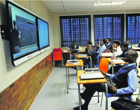 As a country we need to innovate more to plan for the jobs and needs of the coming generation, such as the pupils of Boitumelong, who are now equipped with tablets and interactive boards Picture: Leon Sadiki
