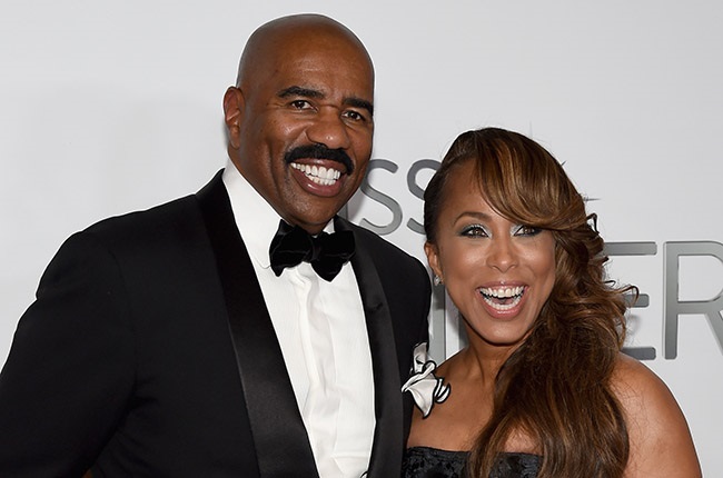 Television personality and host Steve Harvey (L) and his wife Marjorie Harvey attend the 2015 Miss Universe Pageant at Planet Hollywood Resort & Casino in Las Vegas, Nevada.