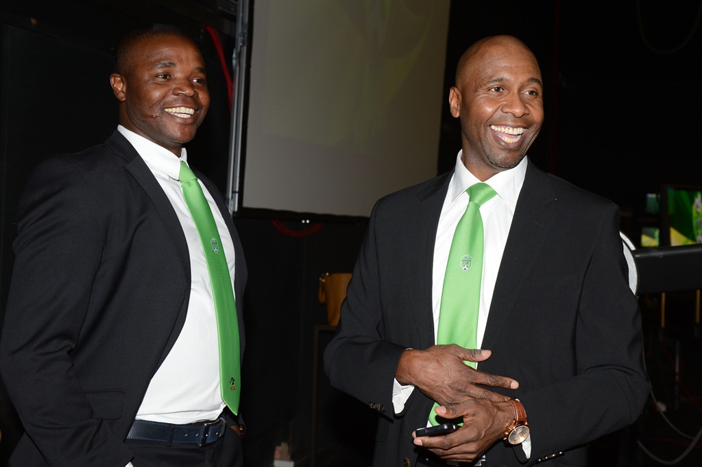 Former Bafana captain Aaron Mokoena and Lucas Radebe during the Nedbank Cup Draw at SuperSport Studios on January 16, 2014 in Johannesburg, South Africa. 