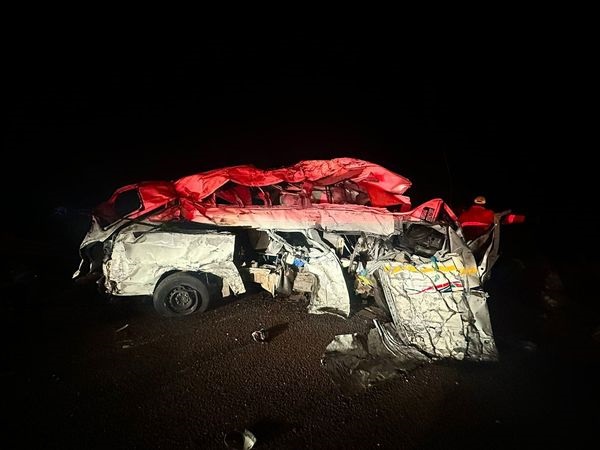 HORROR: What's left of the minibus following the deadly accident. 