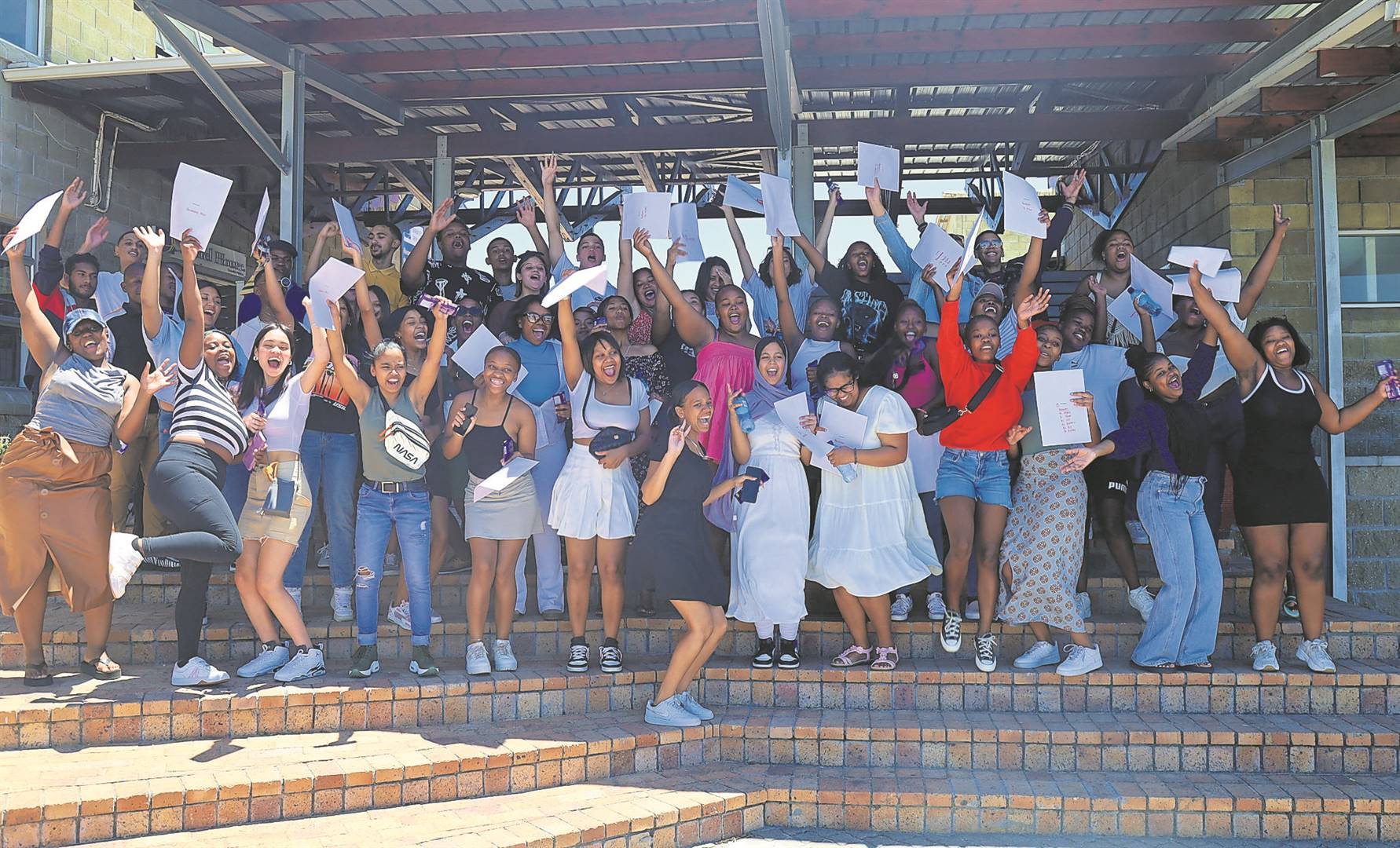 The class of 2023 matrics at Christel House SA in Ottery celebrated a 100% pass rate. PHOTO: Supplied