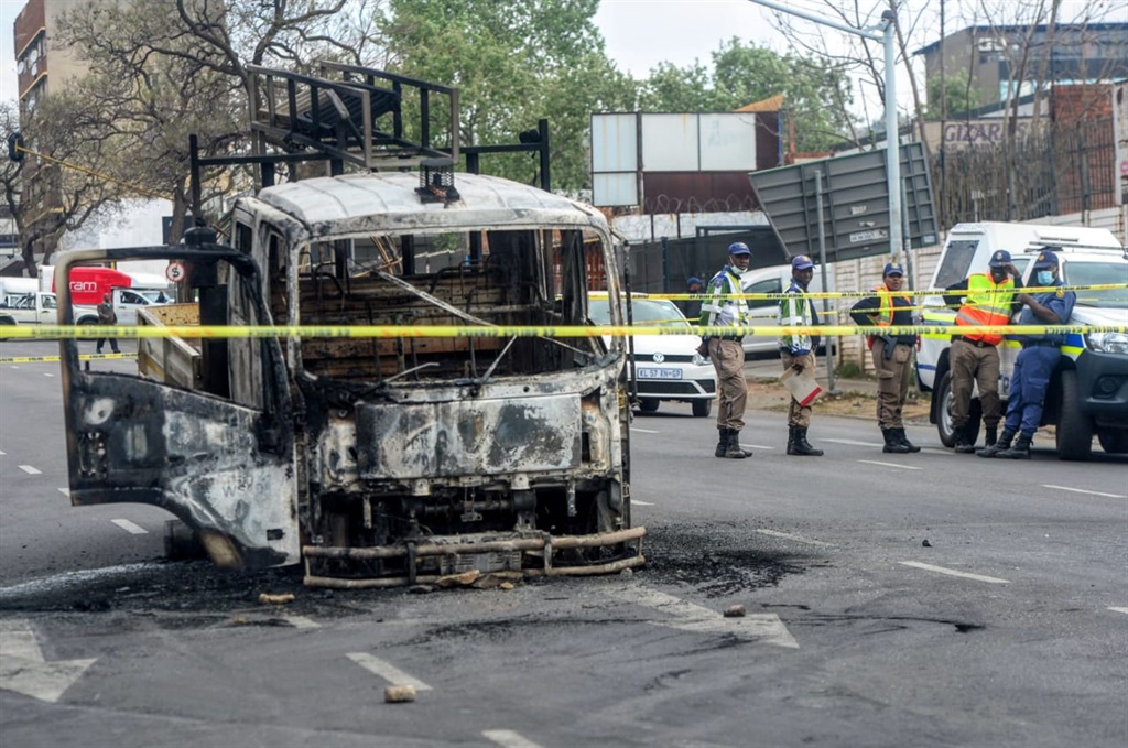 Four City of Tshwane vehicles were burnt on Wednesday, 13 September. Photo by Raymond Morare