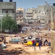 Libya flood survivors pick through ruins in search of missing thousands as disease threat looms