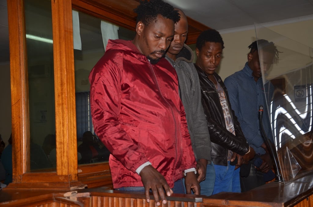 From Left: Evidence Nkuna, Kriel Khoza, Christ Zwane and Prayer Mdluli in the court dock. Photo by Oris Mnisi 