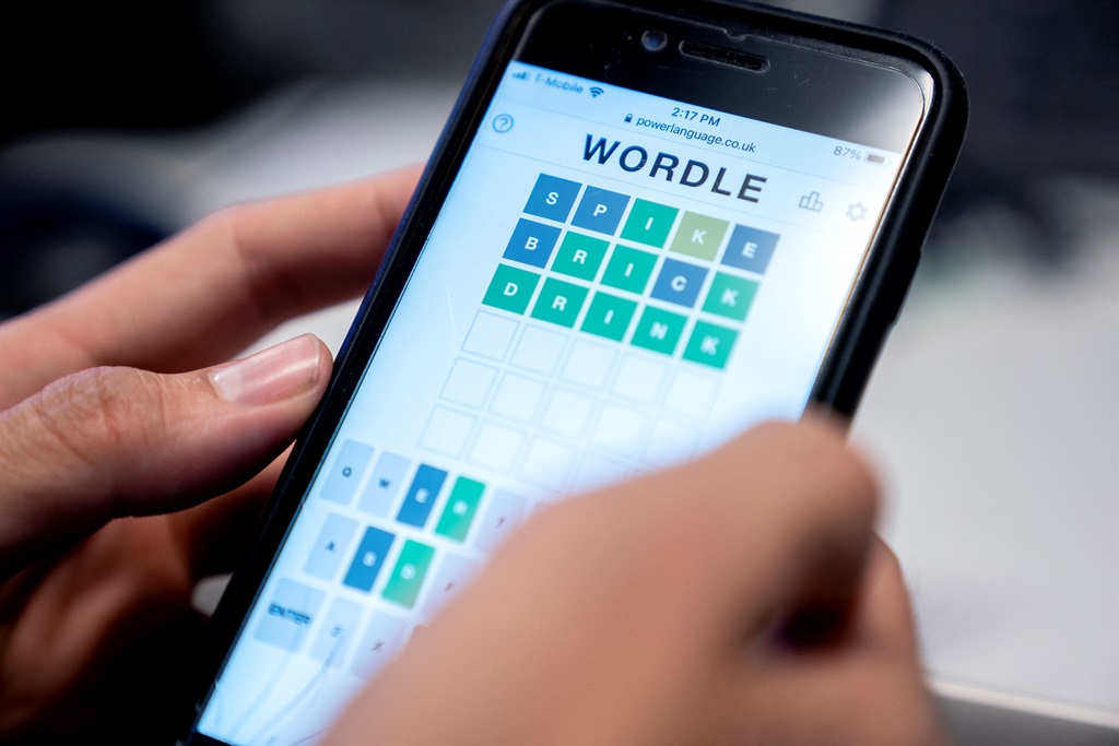 This photo illustration shows a person playing online word game "Wordle" on a mobile phone in Washington, DC. Twitter suspended a bot account on Wednesday for spoiling the solution to the next day's Wordle, the wildly popular internet word puzzle.
The game, which only offers one puzzle per day, has amassed millions of players since it came online last year. (Stefani Reynolds / AFP)