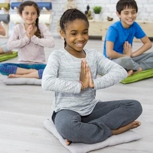 Some parents have found yoga helps to ease their kids' ADHD symptoms.