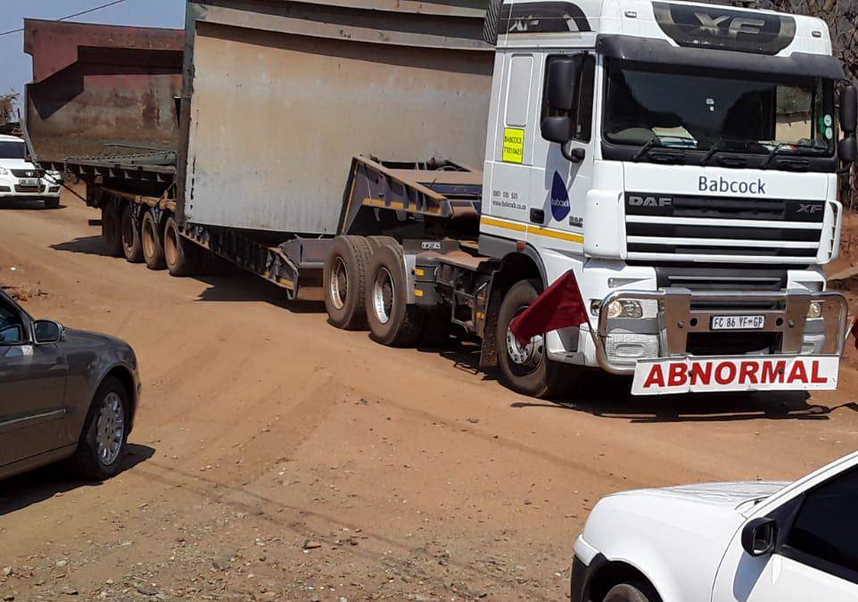 Trucks seen hauling away mining gear. Employees fear the mine is  being stripped. Picture: Supplied
