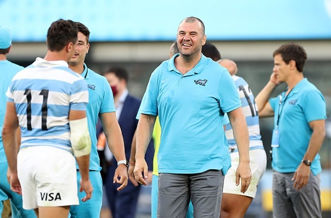 Former Wallabies coach Michael Cheika, now with Argentina, celebrates with Juan Imhoff of the Pumas after winning the 2020 Tri-Nations against the All Blacks in Parramatta, Sydney on 14 November 2020. 