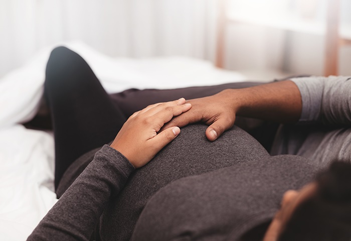 Pregnancy adds pressure on the mother and father from a physical, financial, emotional, and psychological perspective. (jacoblund/Getty Images) 