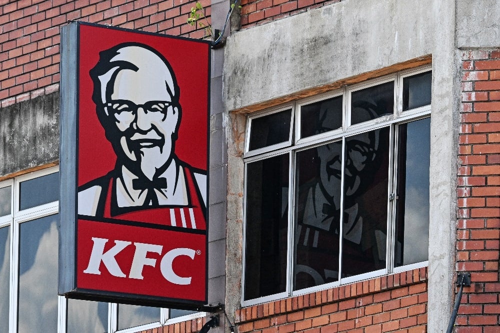 The Kentucky Fried Chicken (KFC) logo is pictured at a restaurant in Malaysia's Pahang state on 30 April. (Mohd Rasfan/AFP)