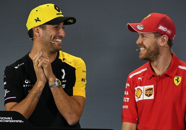 Ferraris German driver Sebastian Vettel (R) and Renaults Australian driver Daniel Ricciardo. Image: AFP / William West