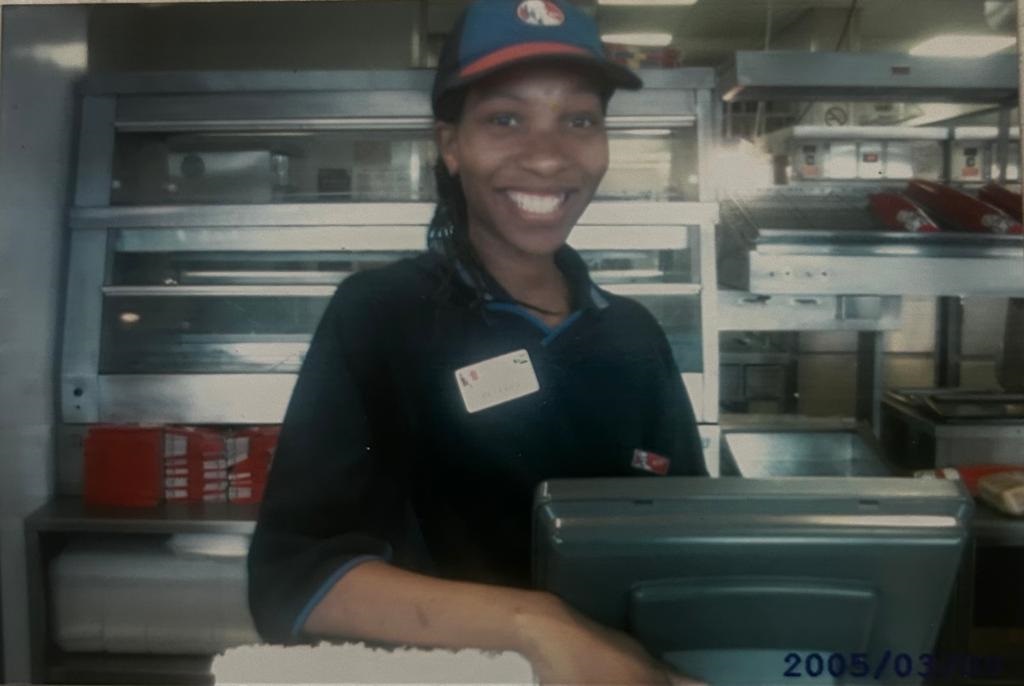 Beverly Malebathi as a KFC cashier is photographed in 2005.