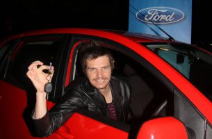 WINNING SMILE: Idols winner Elvis Blue receives the keys to a new Ford Figo.