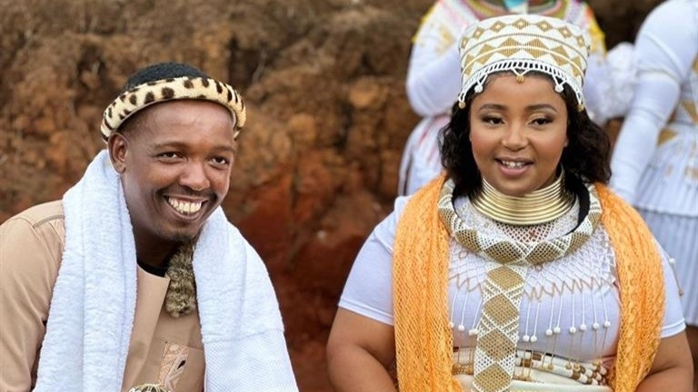 Maskandi singer Mbuzeni Mkhize with his wife, Noxolo Chiliza, during their traditional wedding on Saturday, 21 October. 