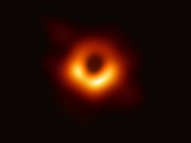 The first image of a black hole, obtained using Event Horizon Telescope observations of the centre of the galaxy M87. The image shows a bright ring formed as light bends in the intense gravity around the black hole.