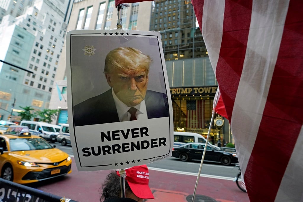 SupportersTrump gather outside Trump Tower after he was convicted in his criminal trial in New York City, on 30 May 2024. (TIMOTHY A. CLARY / AFP)