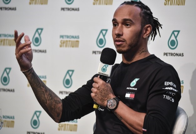 F1 World Champion, Mercedes' driver Lewis Hamilton, delivers a press conference in Sao Paulo, Brazil, on November 13, ahead of the upcoming Formula 1 Brazilian Grand Prix on November 17. NELSON ALMEIDA / AFP