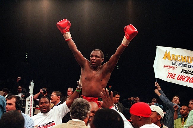 Dingaan Thobela celebrates bating Glenn Catley at Carnival City back in 2000. (Duif du Toit/Gallo Images)