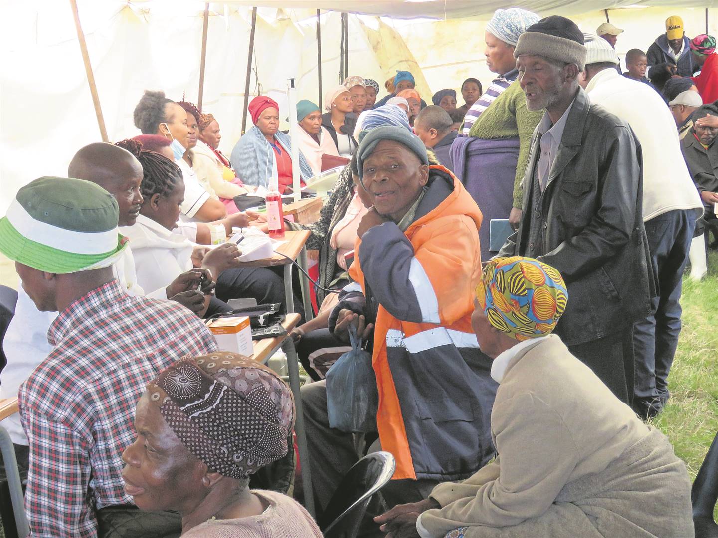 Villagers who came to take advantage of the free healthcare services offered on the day being attended to at the registration tent.                         
