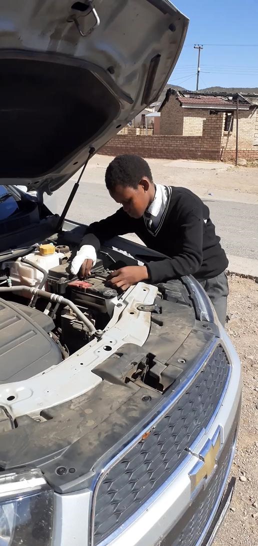 The pupil fixes actress Nomasebe Dondolo’s car after it gave her problems at Dongwe in Lukanji, Eastern Cape yesterday morning.