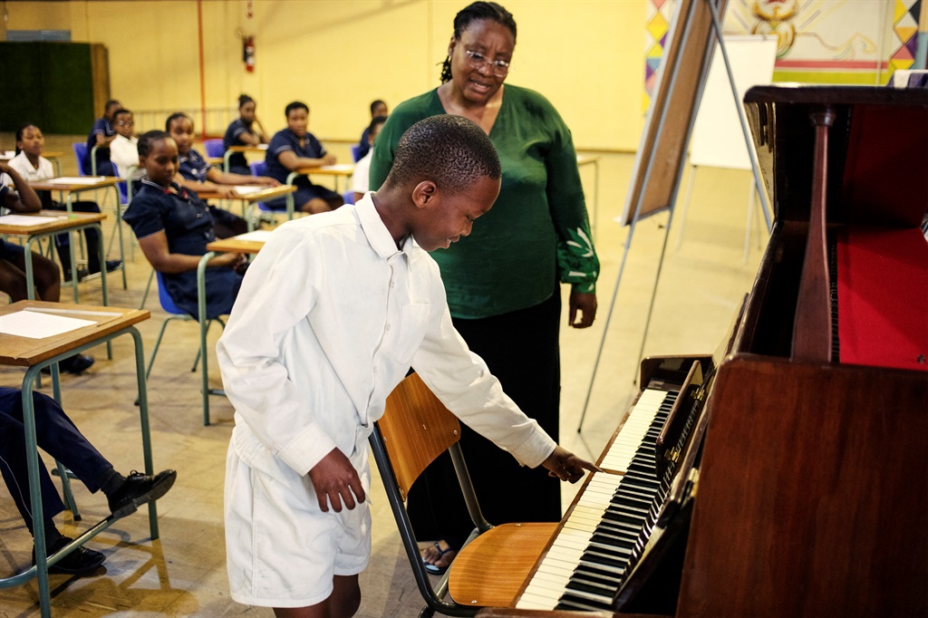 University of Cape Town School of Opera lecturer Paulina Malefane teaches music to children of the Masiphumelele Primary school in Khayelitsha, Cape Town.