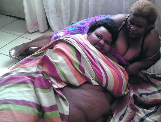 Nomthandazo Matibe looks after her daughter Sinovuyo. Photo by Mbulelo Sisulu