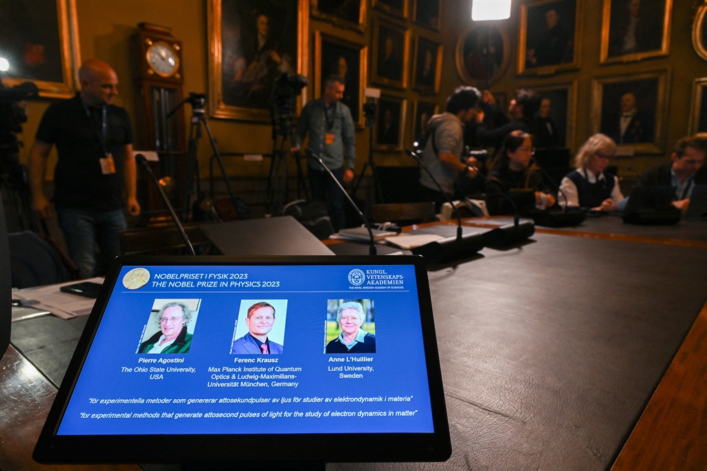 (L-R) A tablet shows Pierre Agostini,  Ferenc Krausz, and Anne LÃ­Huillier during the announcement of the winners of the 2023 Nobel Prize in Physics at Royal Swedish Academy of Sciences in Stockholm on 3 October 2023. (Photo by Jonathan NACKSTRAND / AFP)