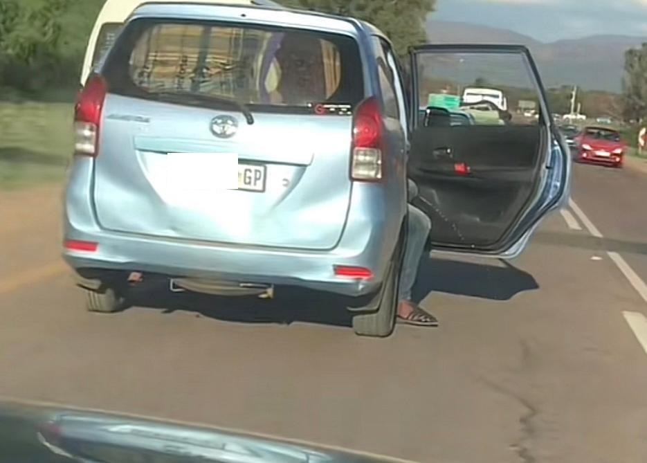 Man caught urinating in moving vehicle. Screenshot from TikTok 