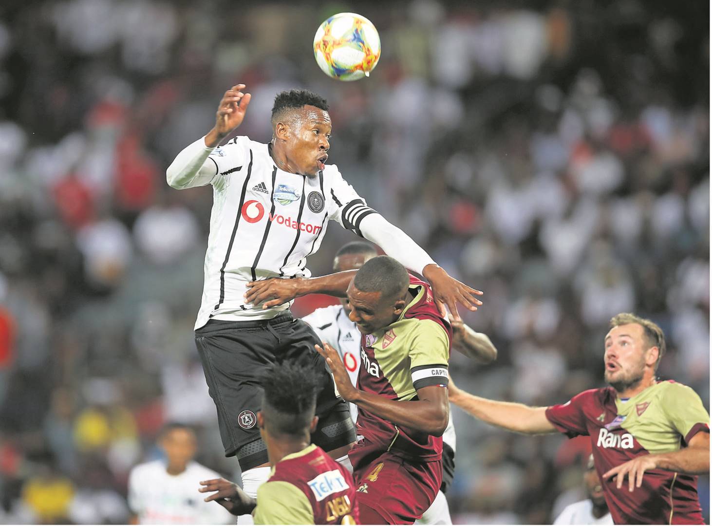Happy Jele of Orlando Pirates is challenged by Rafiq De Goede of Stellenbosch FC during the Telkom Knockout Last 16 match at Orlando Stadium. Picture: Samuel Shivambu/Backpagepix