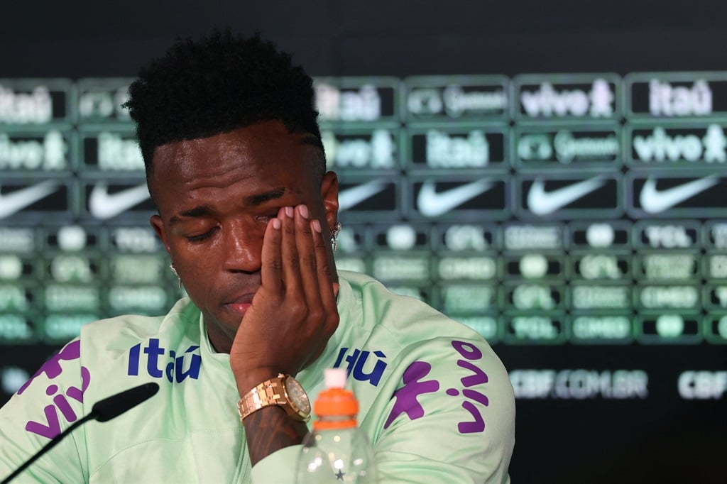 Brazil's forward Vinicius Junior cries as he gives a press conference on the eve of the international friendly football match between Spain and Brazil at the Ciudad Real Madrid training ground in Valdebebas, outskirts of Madrid, on March 25, 2024. Spain arranged a friendly against Brazil at the Santiago Bernabeu under the slogan "One Skin" to help combat racism. (Pierre-Philippe MARCOU / AFP)