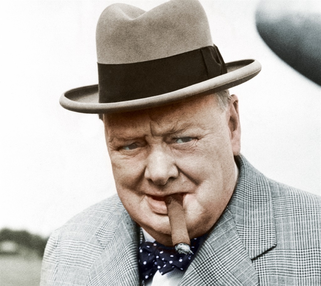 A previous UK leader, Winston Churchill, with one of his trademark cigars in 1949. He had a cold at the time. (Bettmann collection via Getty)