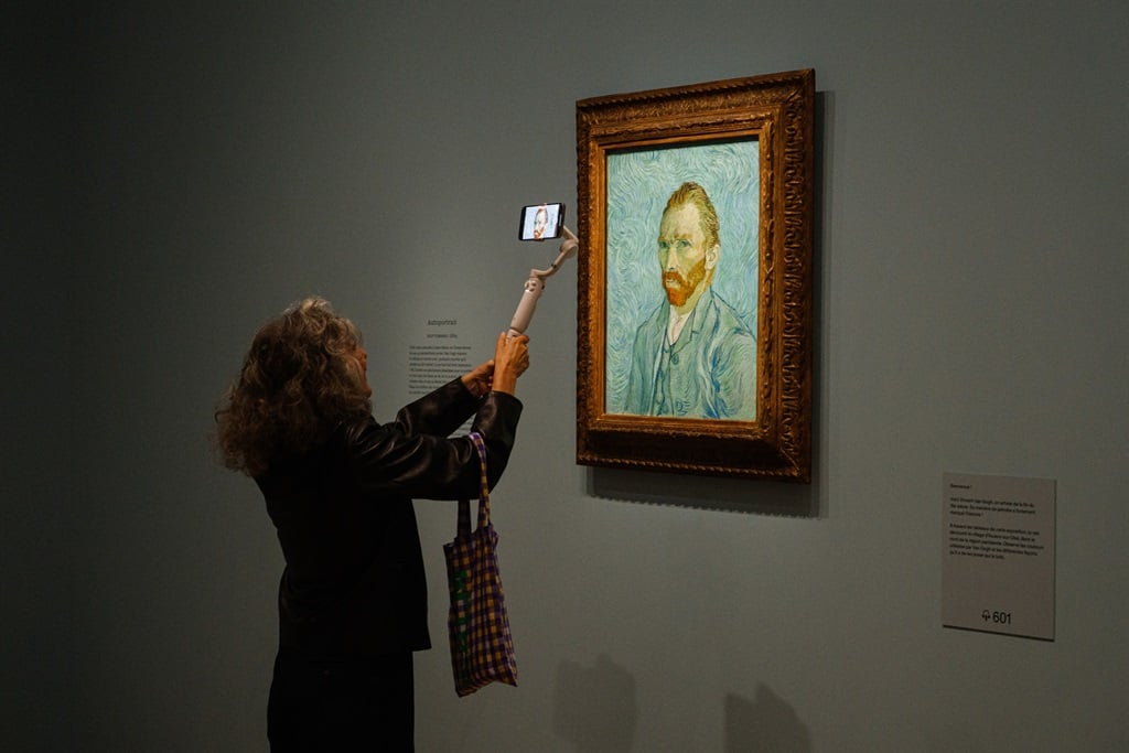 A visitor takes a video of an autoportrait by Vincent Van Gogh during the press preview of the exhibition "Van Gogh in Auvers-sur-Oise, last months" at Orsay Museum in Paris on September 29, 2023.