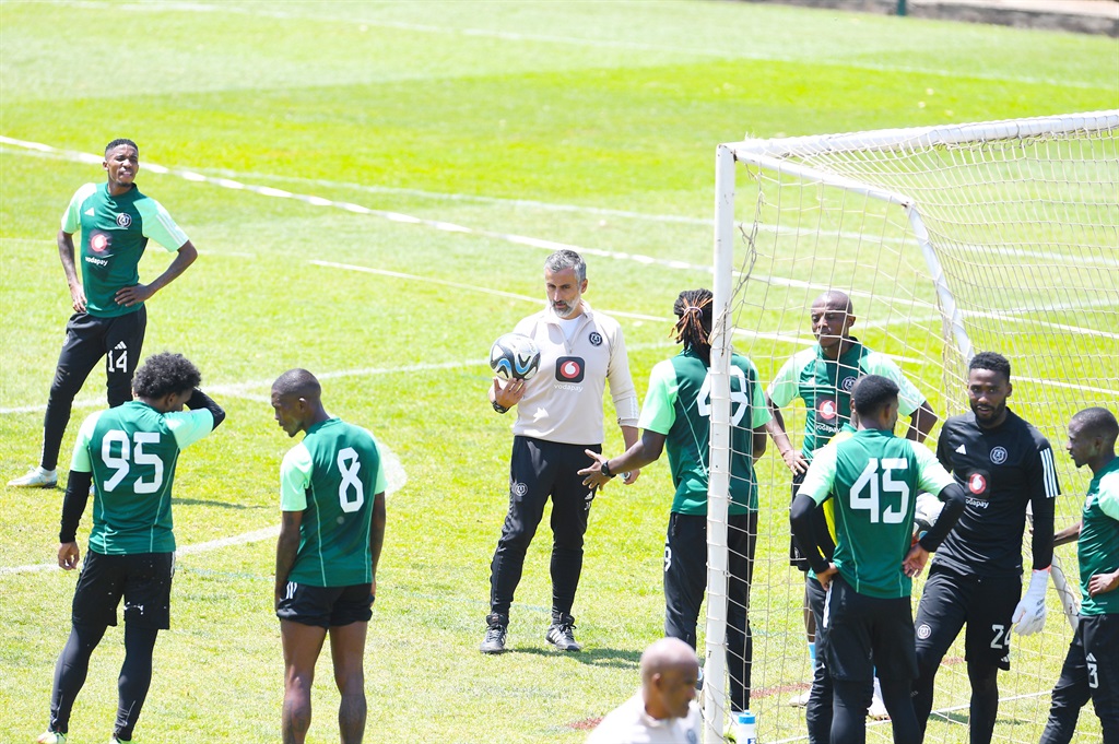 JOHANNESBURG, SOUTH AFRICA - OCTOBER 03: Orlando Pirates coach Jose Riveiro speaks to the players during the Orlando Pirates media open day at Rand Stadium on October 03, 2023 in Johannesburg, South Africa. (Photo by Lefty Shivambu/Gallo Images)