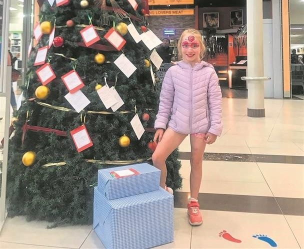 Allegra Garofalo has donated gifts for two girls, a pair of sparkly sandals and a netball.        