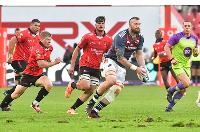 Munster's Springbok lock RG Snyman fields a ball as the Lions defence lurks in Saturday's URC meeting at Ellis Park. (Sydney Seshibedi/Gallo Images)
