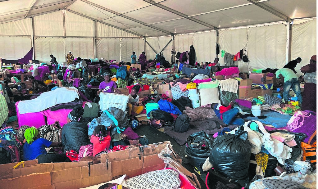 Refugees say they are charged up to R300 to send one email to the department of home affairs.