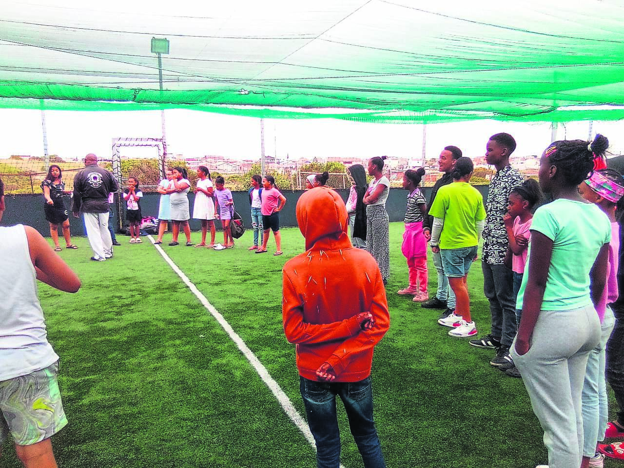 A group of 100 at-risk youth were taught self-defense as part of the intervention programme and fun day.