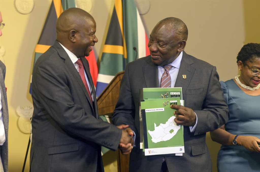 President Cyril Ramaphosa received the Census report from Statistician General Risenga Maluleke at the Union Buildings. Photos by Raymond Morare